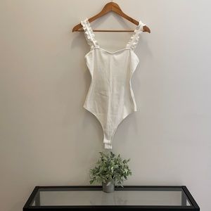 White fringe-shoulder ribbed bodysuit